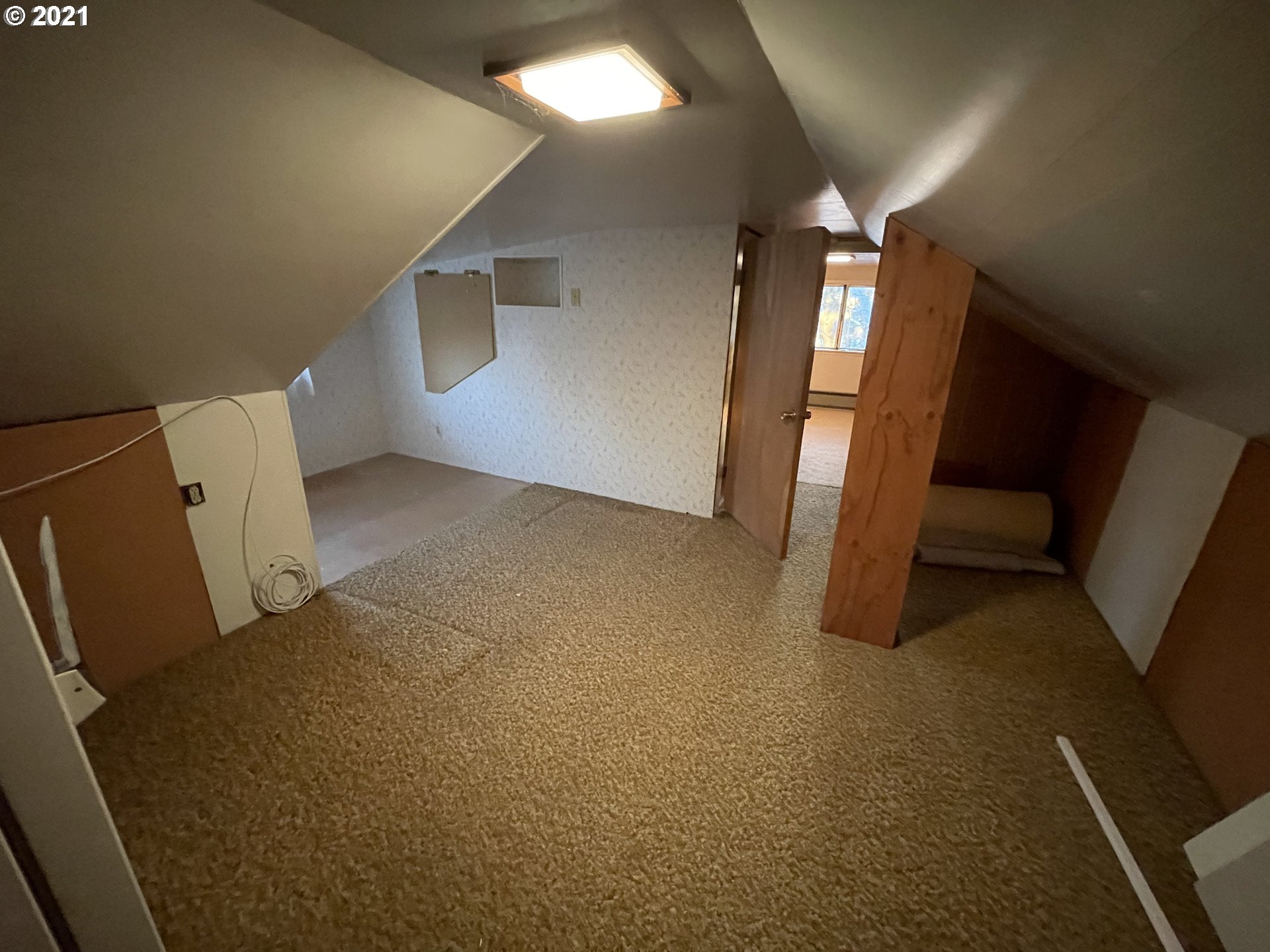 2002 H Street Springfield, OR 97477 - Photo 12 of 17 a view of an empty room with a fireplace