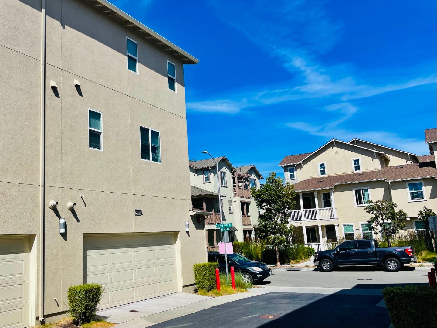 8551 Boardwalk Way Newark, CA 94560 - Photo 2 of 11 a front view of a building with street view