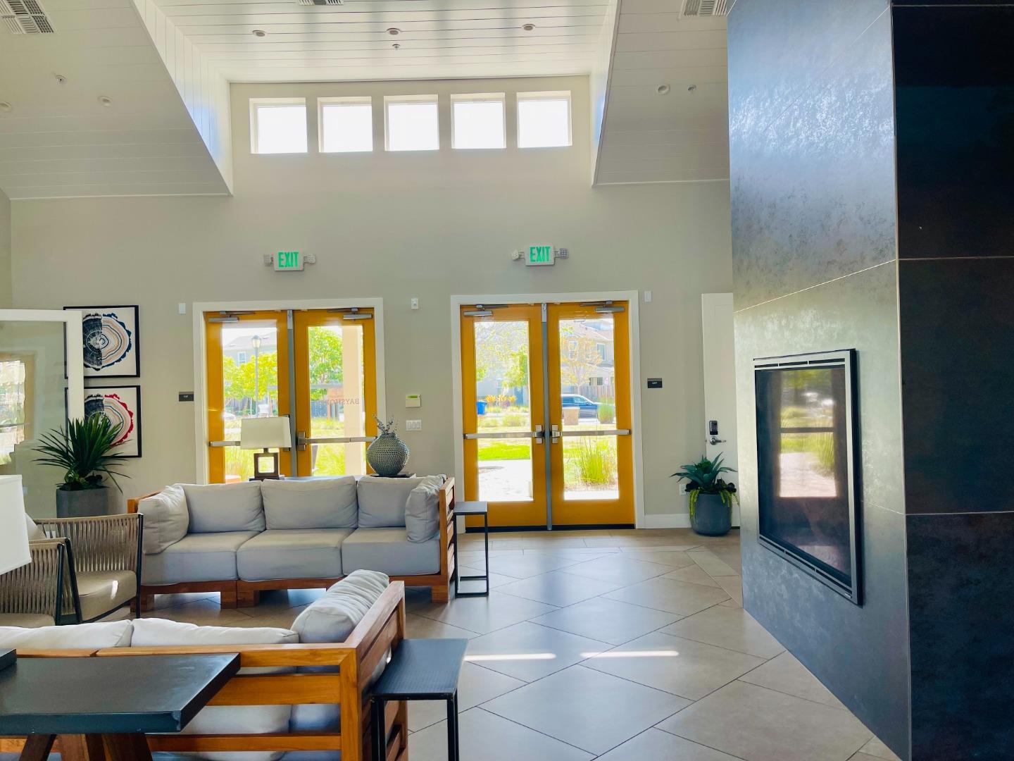 8551 Boardwalk Way Newark, CA 94560 - Photo 10 of 11 a living room with furniture and a large window