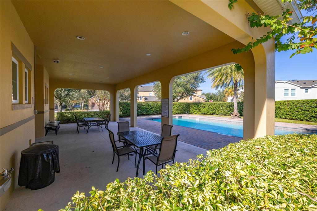 12333 Via Derna Place Windermere, FL 34786 - Photo 54 of 56 a outdoor living space with furniture and garden view