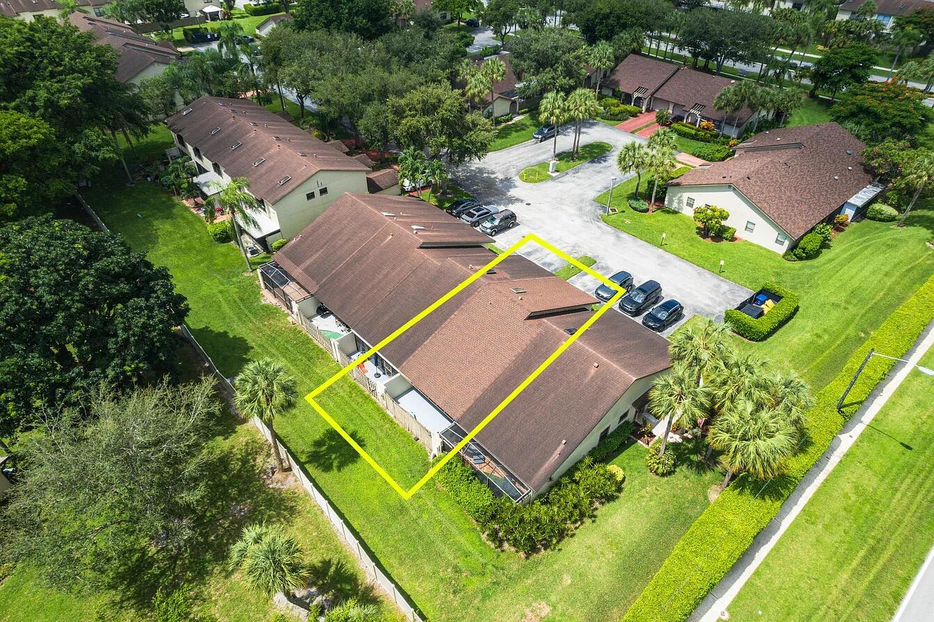 23284 Southwest 53rd Avenue, Unit D Boca Raton, FL 33433 - Photo 12 of 22 an aerial view of a house