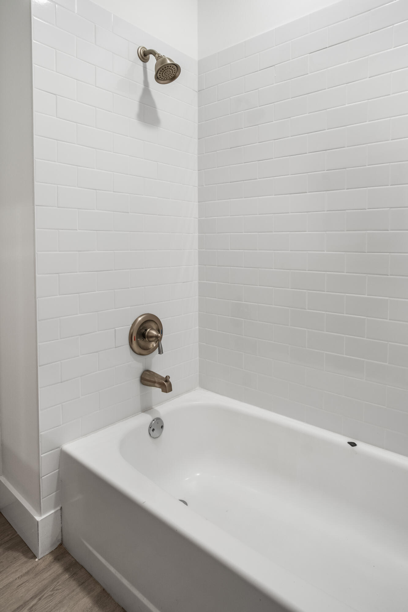 23284 Southwest 53rd Avenue, Unit D Boca Raton, FL 33433 - Photo 6 of 22 a bathroom with a white bath tub