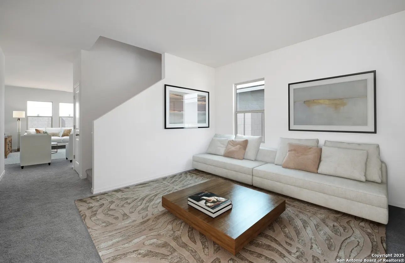 10514 Lesser Snow Adkins, TX 78101 - Photo 7 of 15 a living room with furniture and a couch
