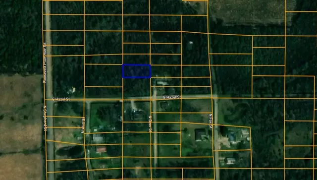 a view of a wooden fence and a window