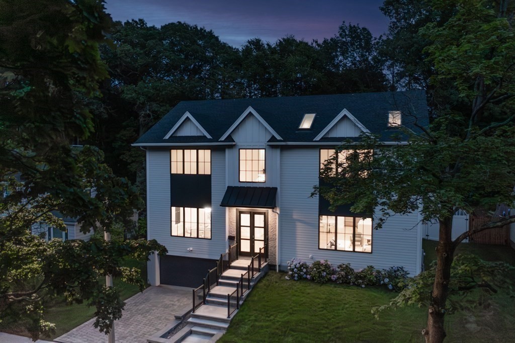 142 Bellingham Road Chestnut Hill, MA 02467 - Photo 32 of 37 a front view of a house with a yard