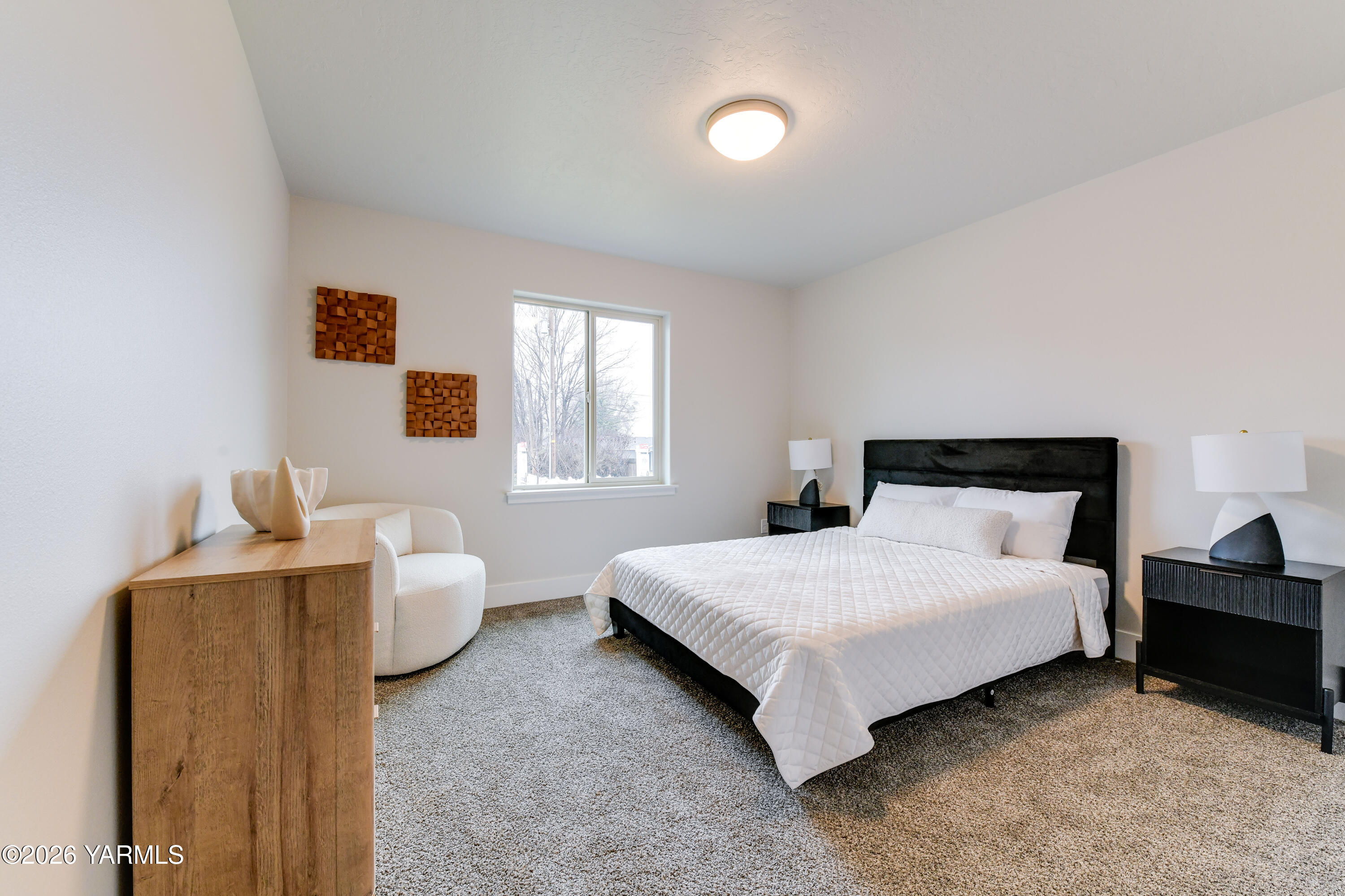 903 North Euclid Road, Unit PHASE 1 LOT 8) SPEC Grandview, WA 98930 - Photo 5 of 25 a bedroom with a bed and window