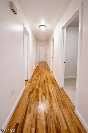 a kitchen with a sink stove and microwave