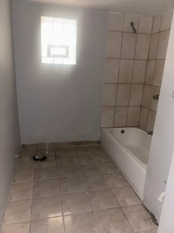 a bathroom with a bathtub