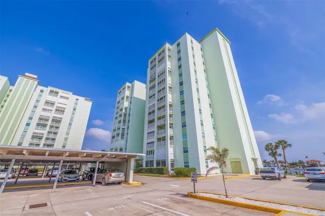 a living room with fireplace furniture and a wooden floor