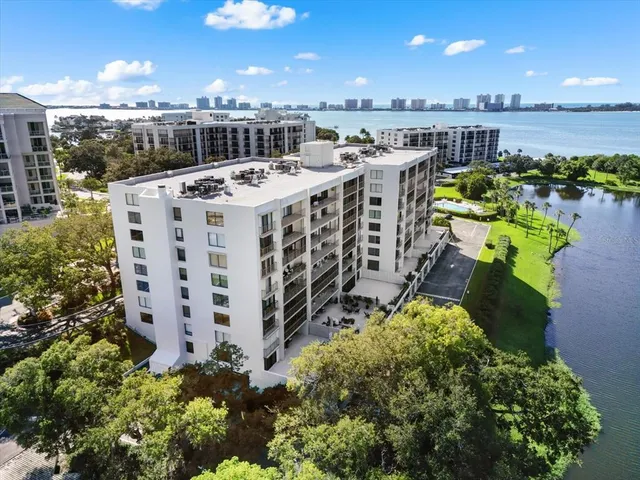 a view of a building with outdoor space and sitting area