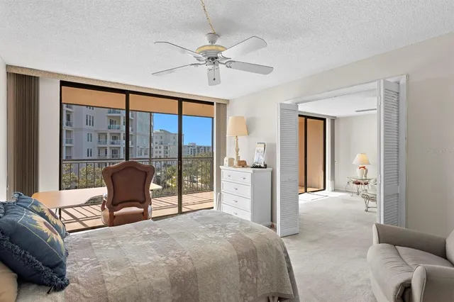 a bedroom with a bed and a couch