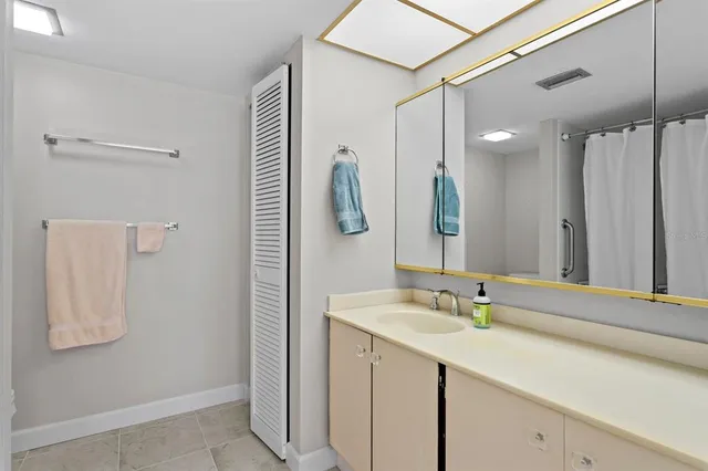 a view of road with palm trees