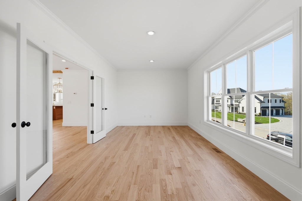 16 Couture Way Middleton, MA 01949 - Photo 12 of 36 wooden floor in an empty room with a window