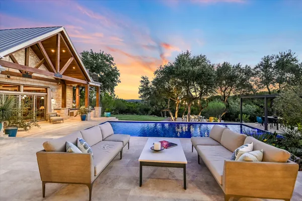 a outdoor living space with furniture and garden