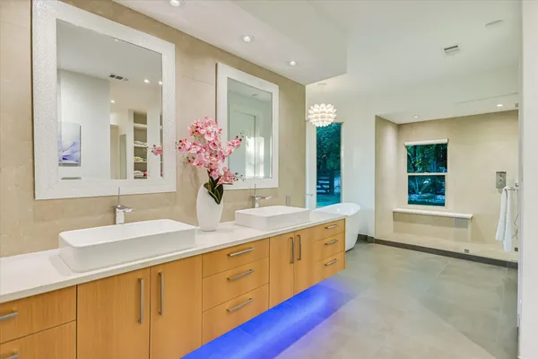a bathroom with a bathtub and shower