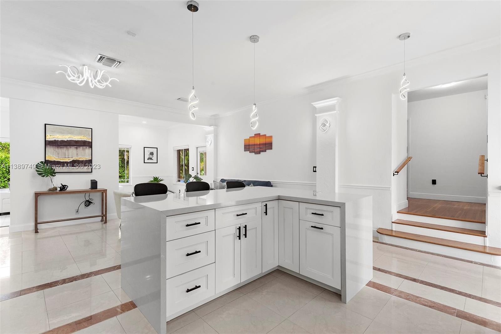 2201 Southwest 84th Avenue Miami, FL 33155 - Photo 14 of 33 a large white kitchen with granite countertop a sink and dishwasher with white cabinets
