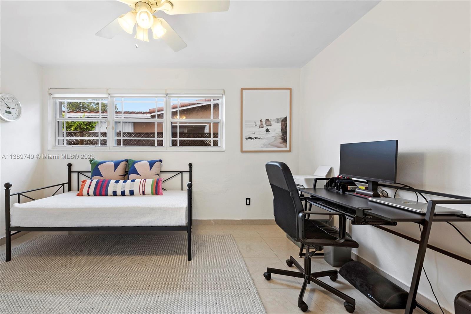 2201 Southwest 84th Avenue Miami, FL 33155 - Photo 25 of 33 a bedroom with furniture and a bed