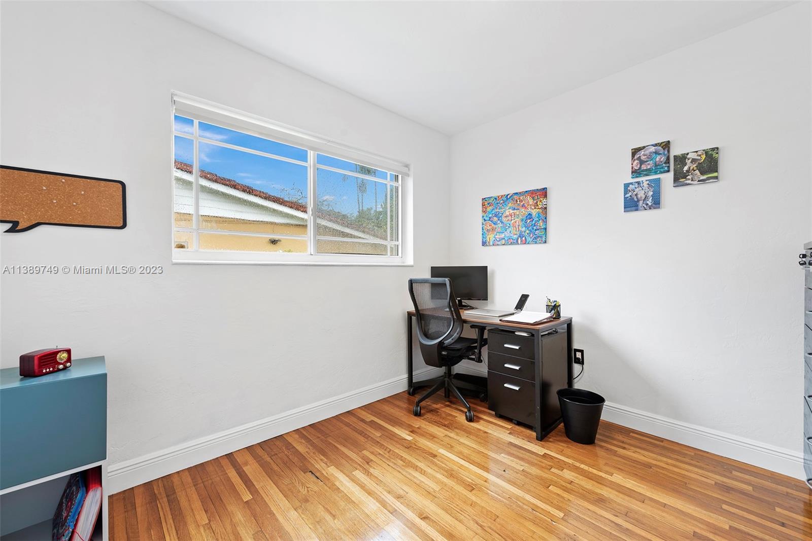 2201 Southwest 84th Avenue Miami, FL 33155 - Photo 28 of 33 a view of a workspace with furniture and a window