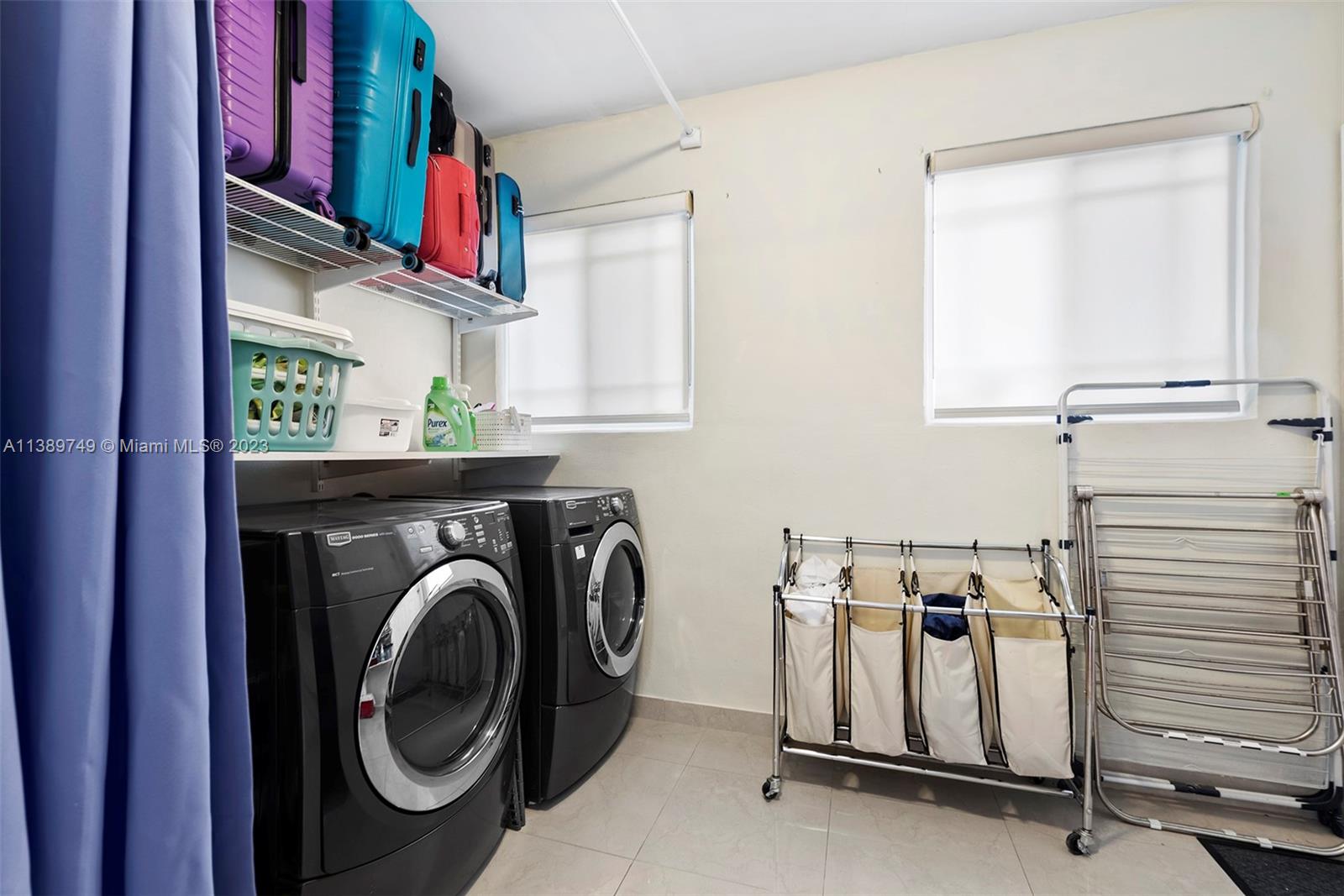 2201 Southwest 84th Avenue Miami, FL 33155 - Photo 29 of 33 a utility room with dryer and washer