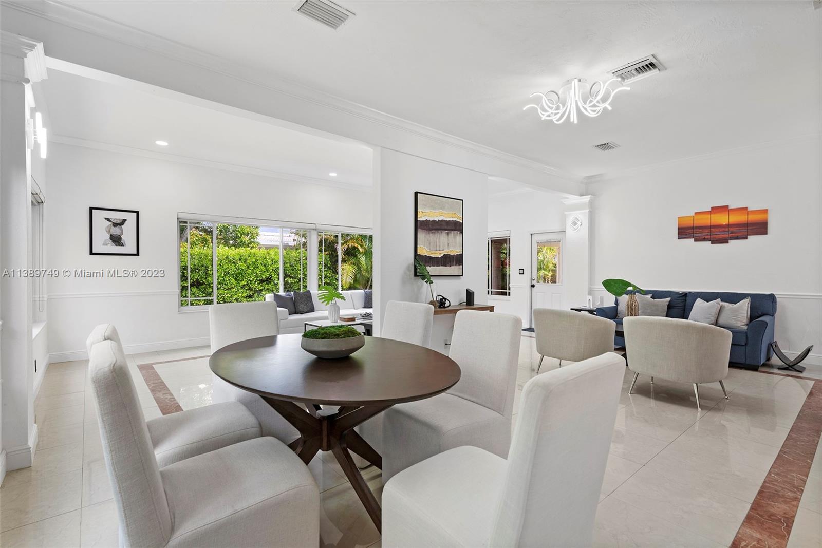 2201 Southwest 84th Avenue Miami, FL 33155 - Photo 7 of 33 a living room with furniture and a potted plant