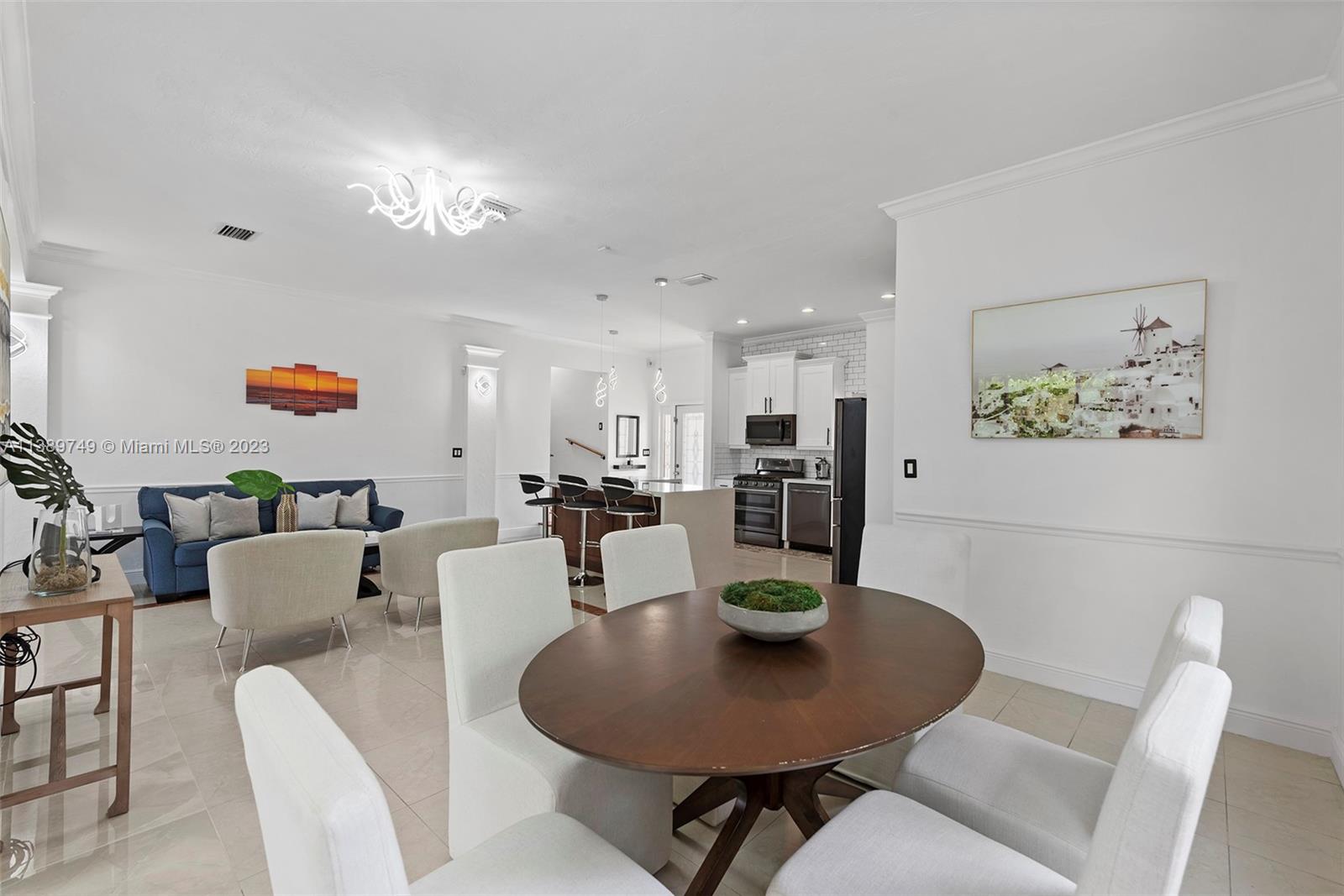 2201 Southwest 84th Avenue Miami, FL 33155 - Photo 9 of 33 a view of a dining room with furniture and wooden floor