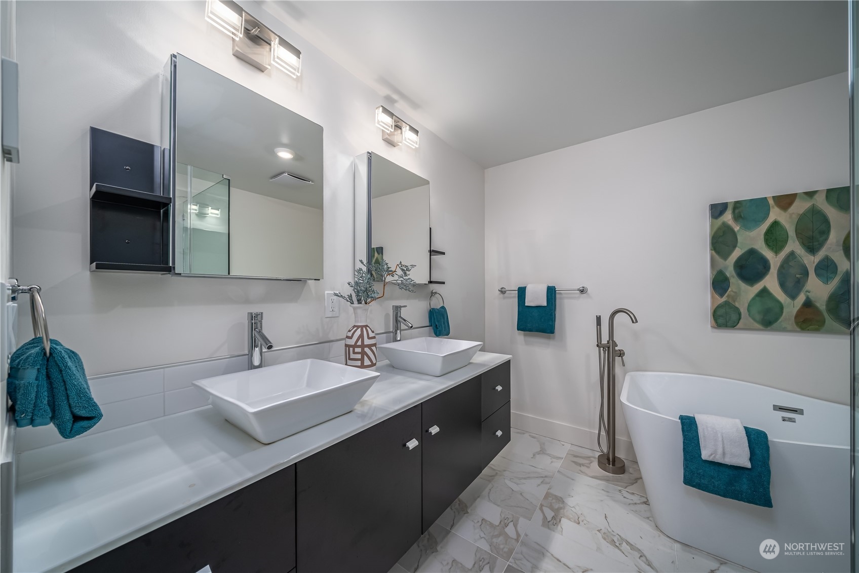 3919 Southwest Monroe Street Seattle, WA 98136 - Photo 16 of 40 a spacious bathroom with a double vanity sink mirror and bathtub