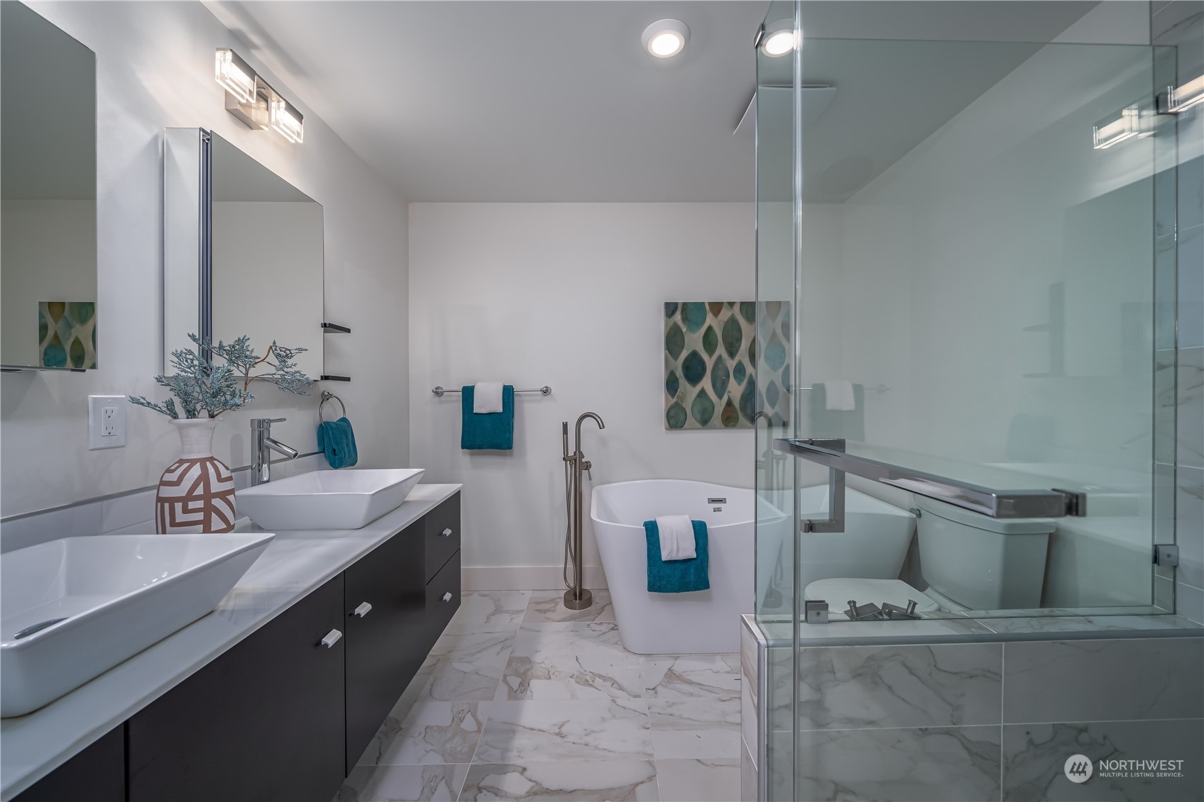 3919 Southwest Monroe Street Seattle, WA 98136 - Photo 17 of 40 a spacious bathroom with a tub sink and mirror