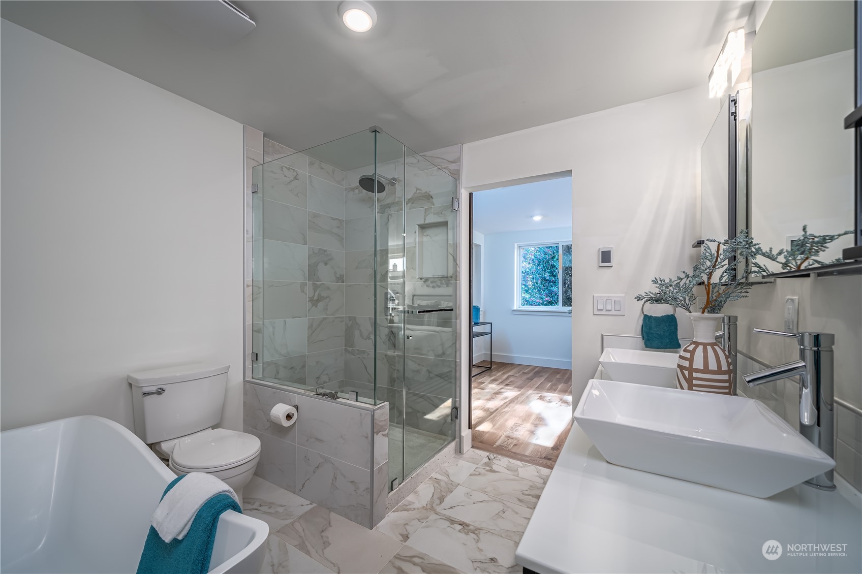 3919 Southwest Monroe Street Seattle, WA 98136 - Photo 18 of 40 a spacious bathroom with a toilet a sink and shower