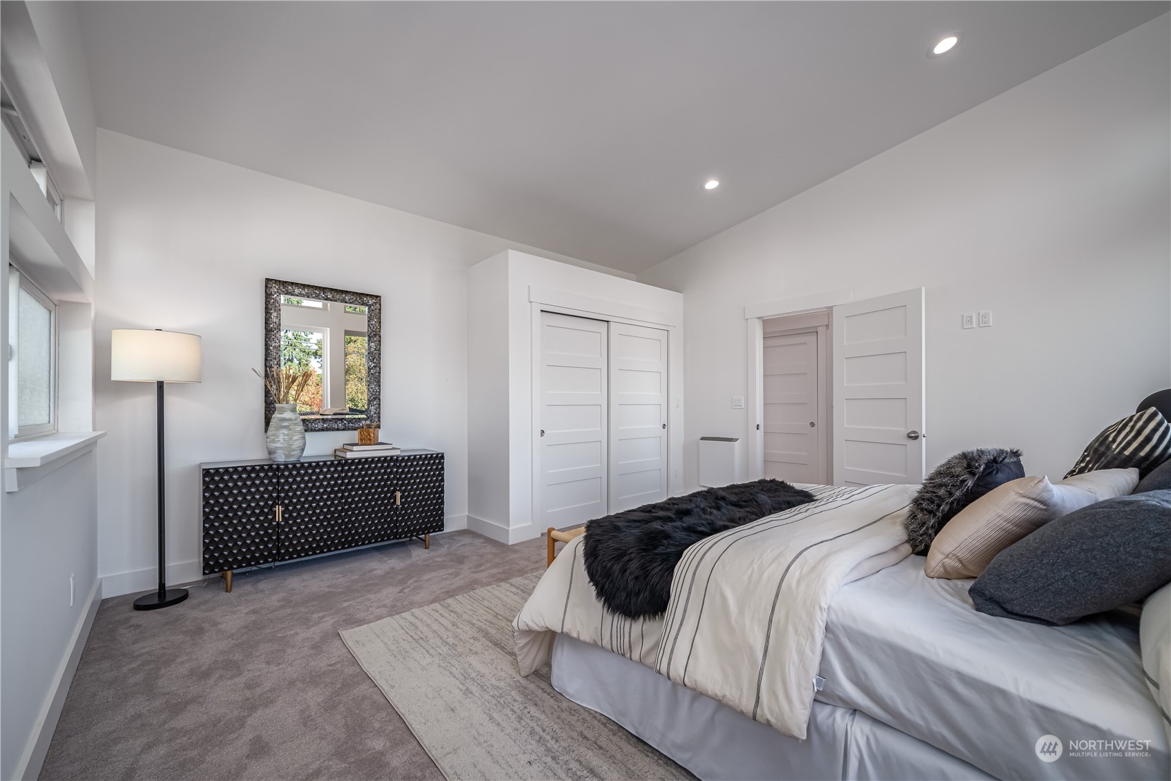 3919 Southwest Monroe Street Seattle, WA 98136 - Photo 21 of 40 a bedroom with a bed and dresser