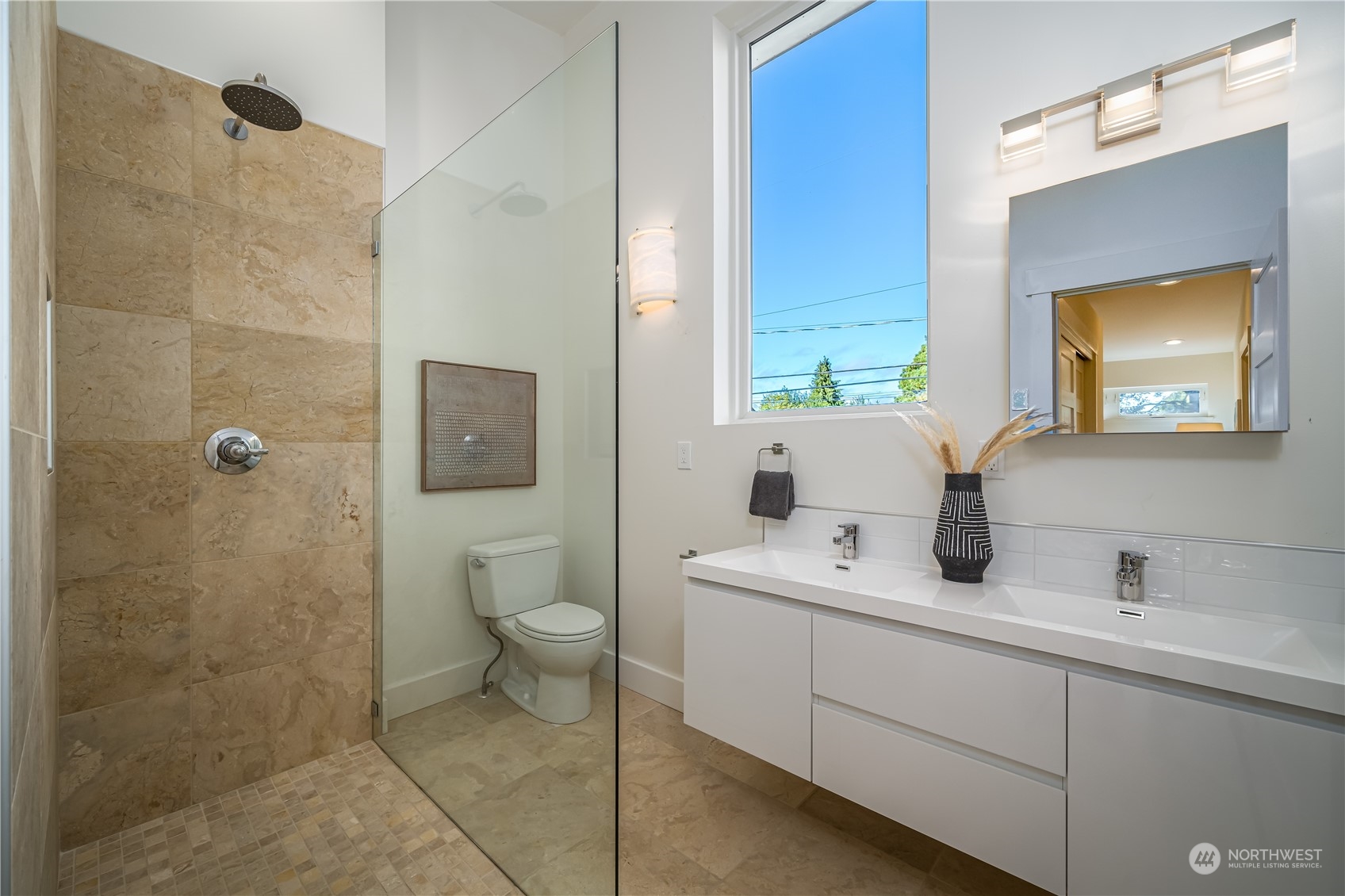 3919 Southwest Monroe Street Seattle, WA 98136 - Photo 22 of 40 a bathroom with a toilet sink and shower