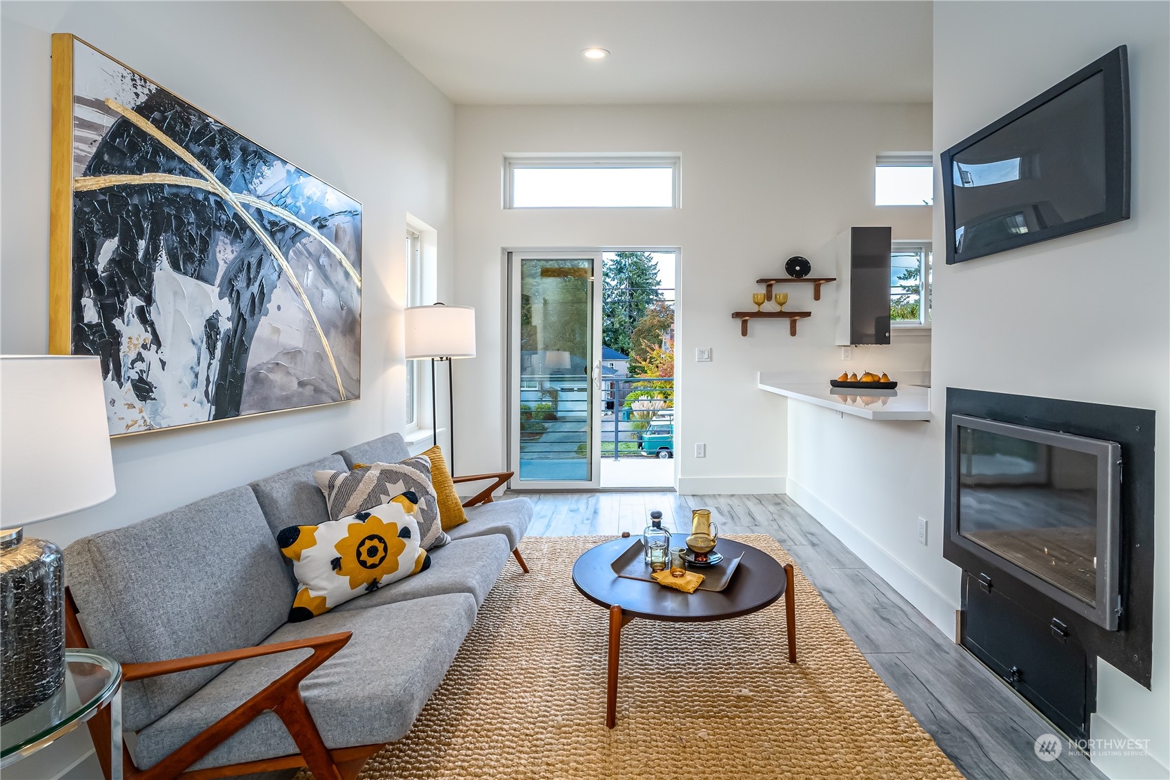 3919 Southwest Monroe Street Seattle, WA 98136 - Photo 25 of 40 a living room with furniture and a wooden floor