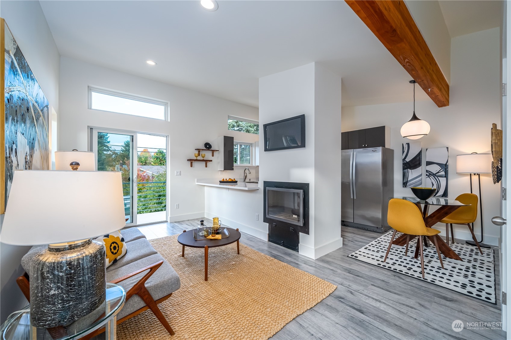 3919 Southwest Monroe Street Seattle, WA 98136 - Photo 26 of 40 a living room with furniture fireplace and window