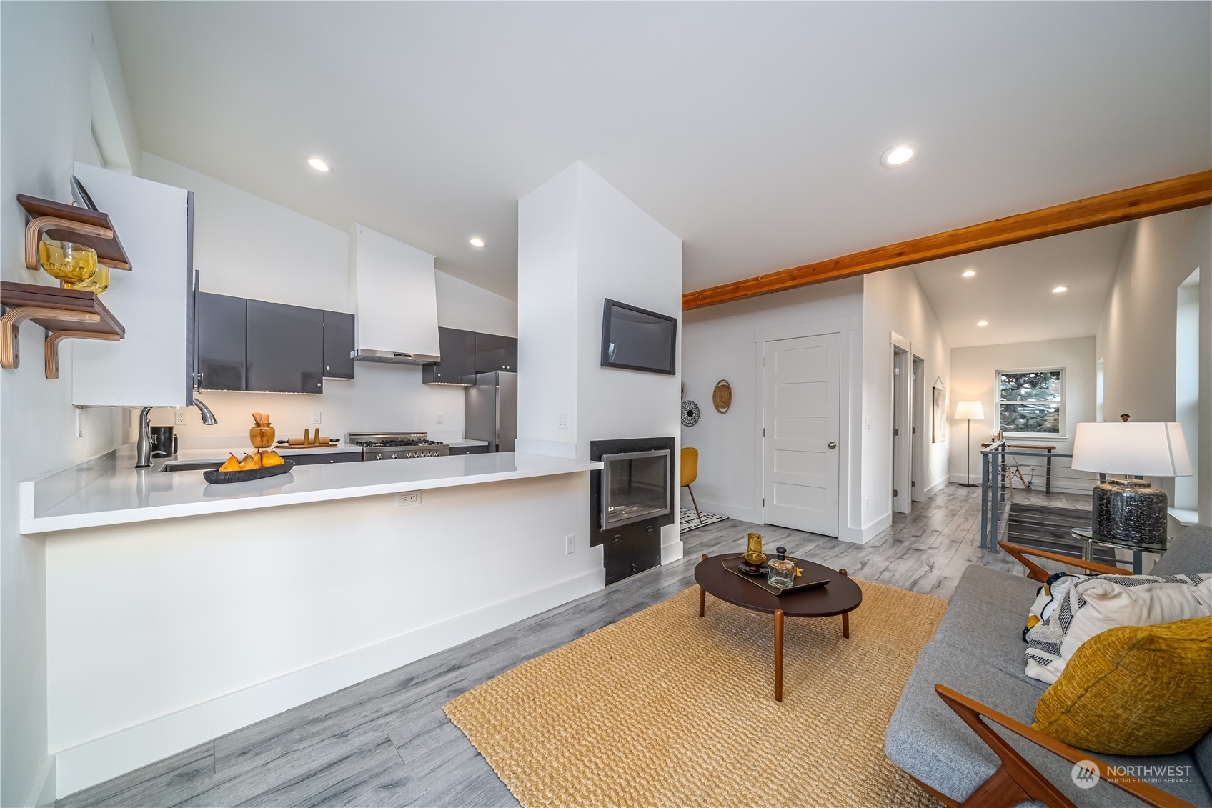 3919 Southwest Monroe Street Seattle, WA 98136 - Photo 27 of 40 a large kitchen with a table and chairs