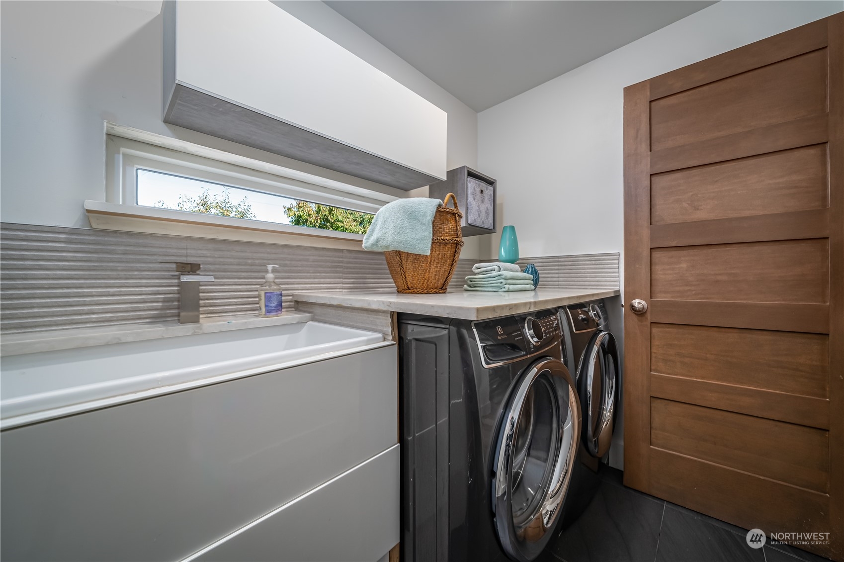 3919 Southwest Monroe Street Seattle, WA 98136 - Photo 33 of 40 a utility room with dryer and washer