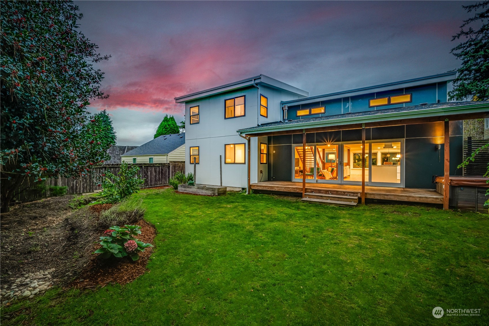 3919 Southwest Monroe Street Seattle, WA 98136 - Photo 37 of 40 a backyard of a house with table and chairs