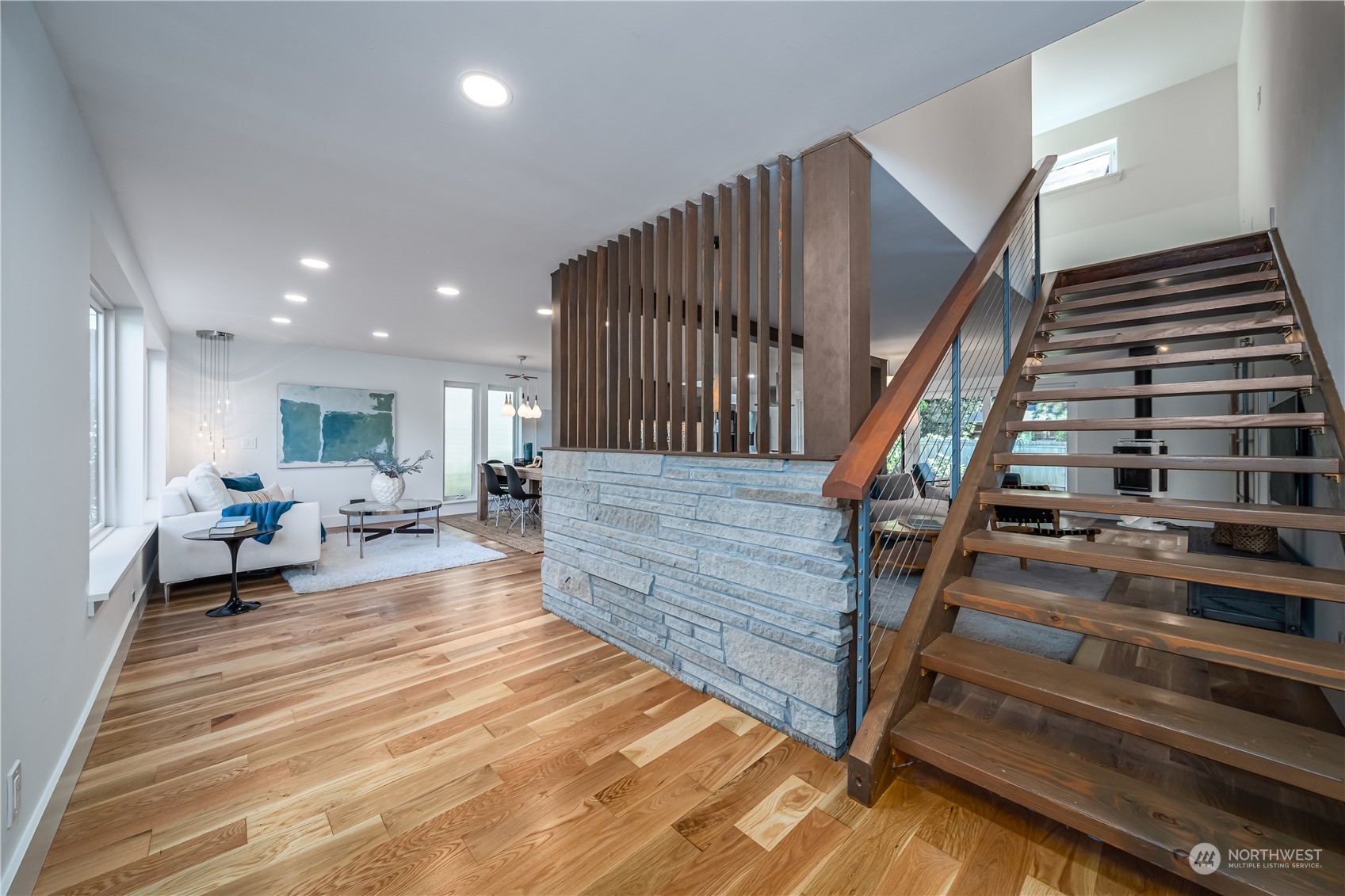 3919 Southwest Monroe Street Seattle, WA 98136 - Photo 4 of 40 a living room with stairs and furniture