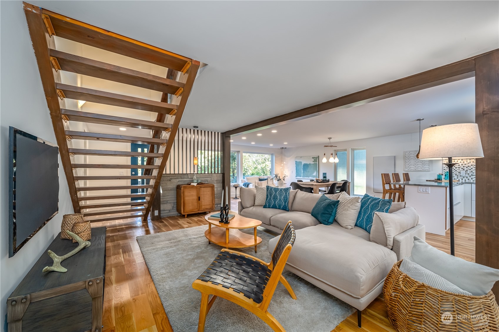 3919 Southwest Monroe Street Seattle, WA 98136 - Photo 10 of 40 a living room with furniture a flat screen tv and a large window