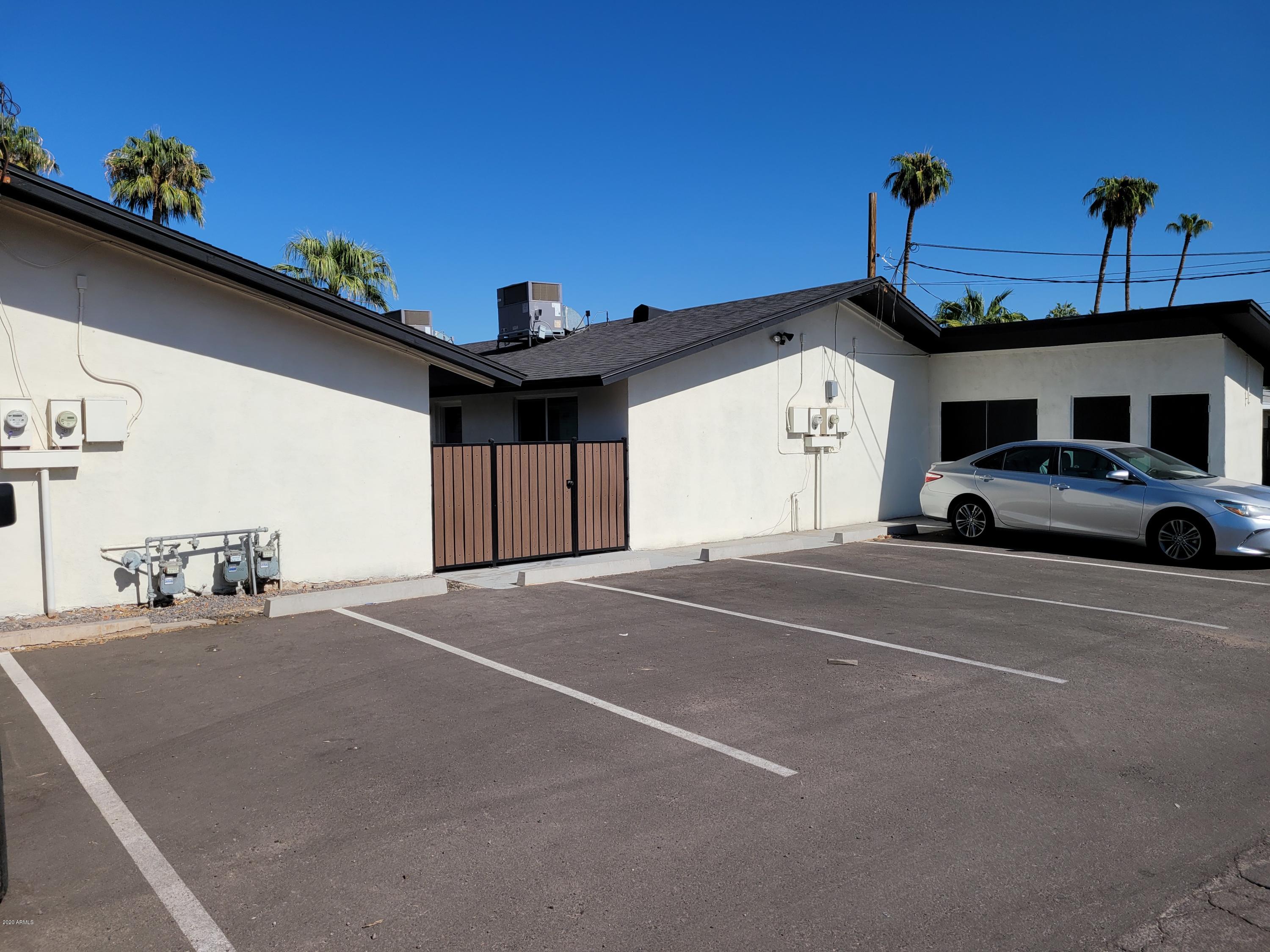 6713 East Cheery Lynn Road, Unit 4 Scottsdale, AZ 85251 - Photo 4 of 12 a view of a car garage