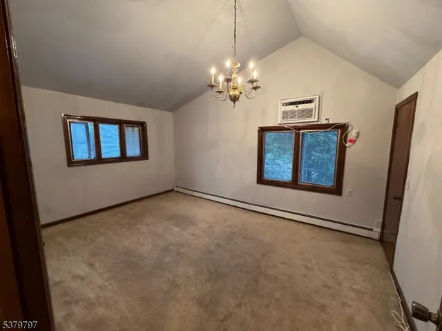 en view of an empty room with a window