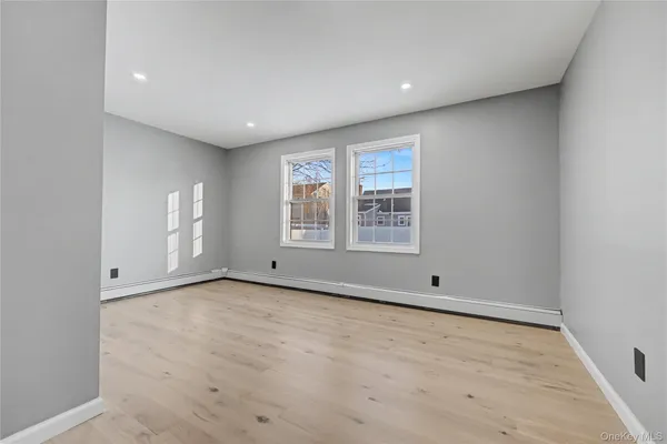 an empty room with windows