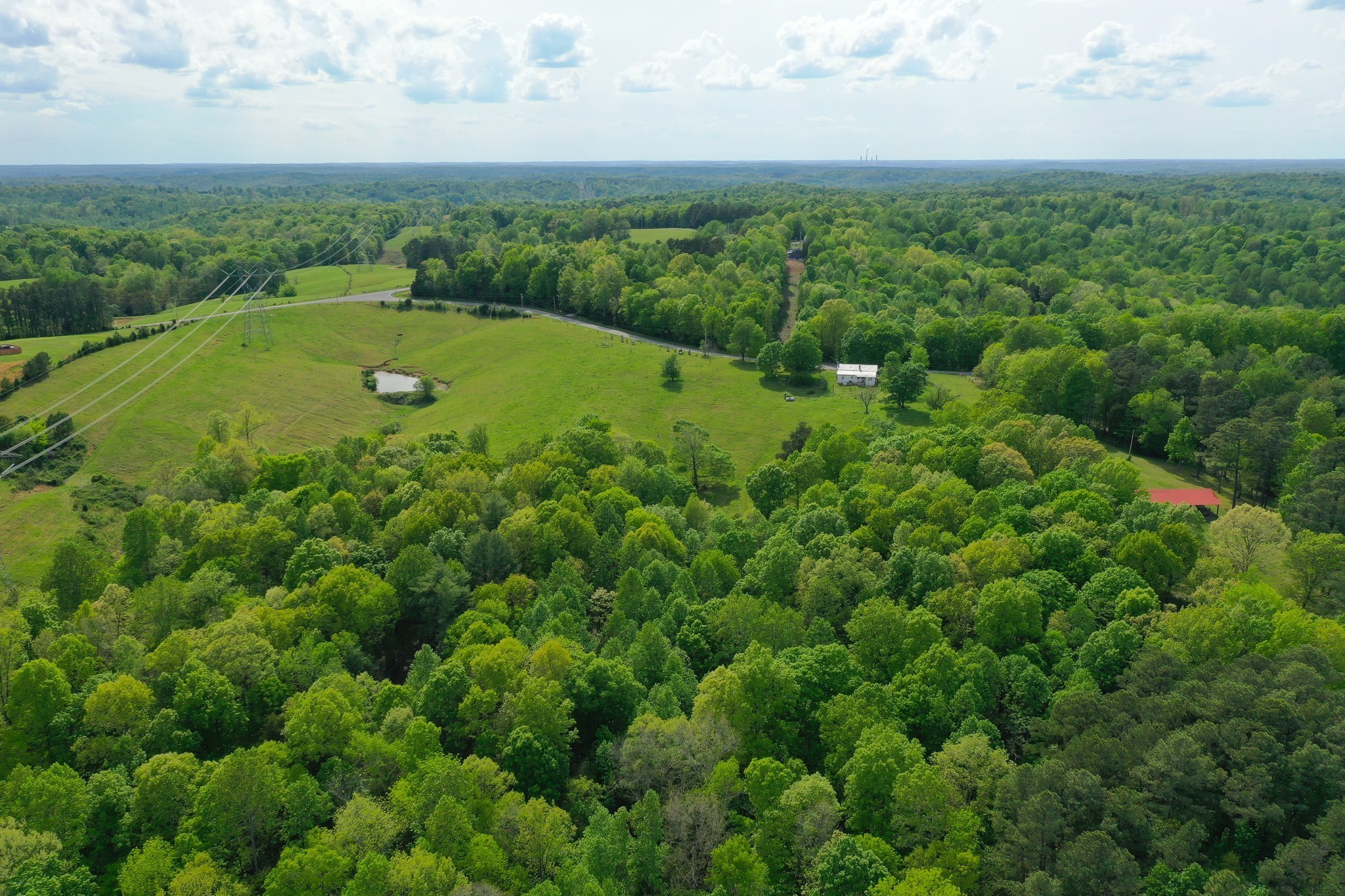 3915 Oak Ridge Road Palmyra, TN 37142 - Photo 30 of 61 an aerial view of a houses with outdoor space and trees all around