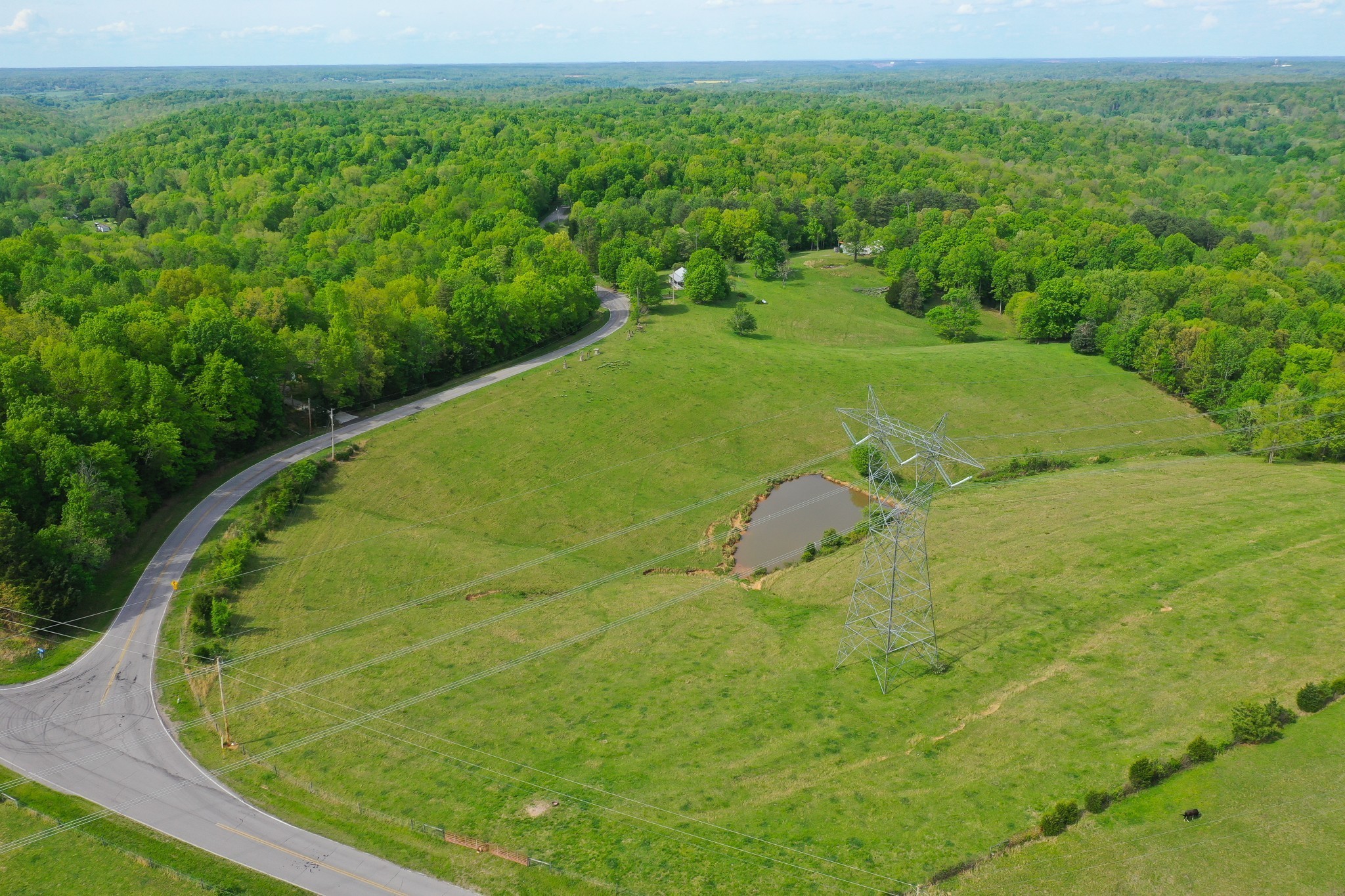 3915 Oak Ridge Road Palmyra, TN 37142 - Photo 35 of 61 a view of a golf course with a garden