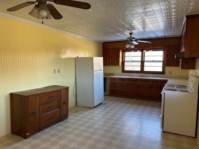 3915 Oak Ridge Road Palmyra, TN 37142 - Photo 51 of 61 a kitchen with a refrigerator and a sink
