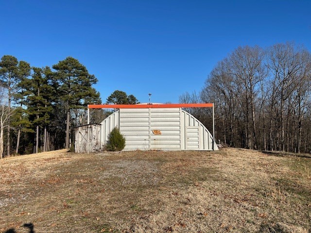 3915 Oak Ridge Road Palmyra, TN 37142 - Photo 57 of 61 a view of a house with a yard
