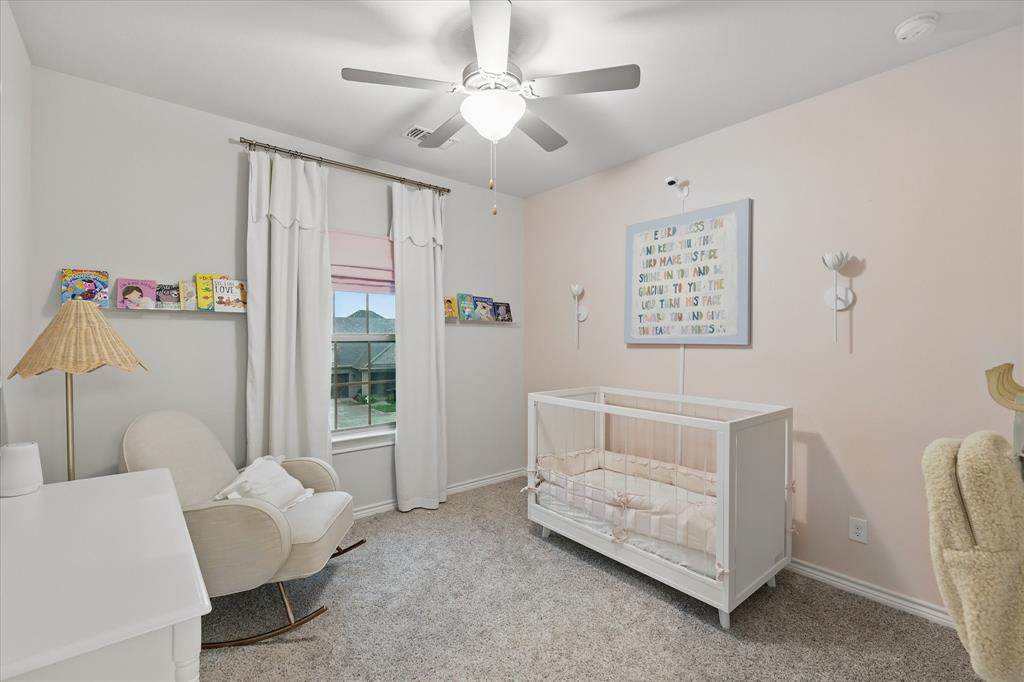 618 Race Drive Forney, TX 75126 - Photo 24 of 39 a living room with furniture and a window