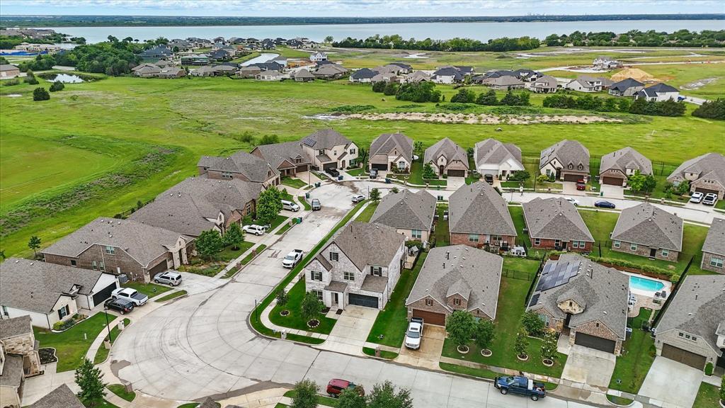 618 Race Drive Forney, TX 75126 - Photo 25 of 39 an aerial view of a house with outdoor space swimming pool tennis courts and ocean view