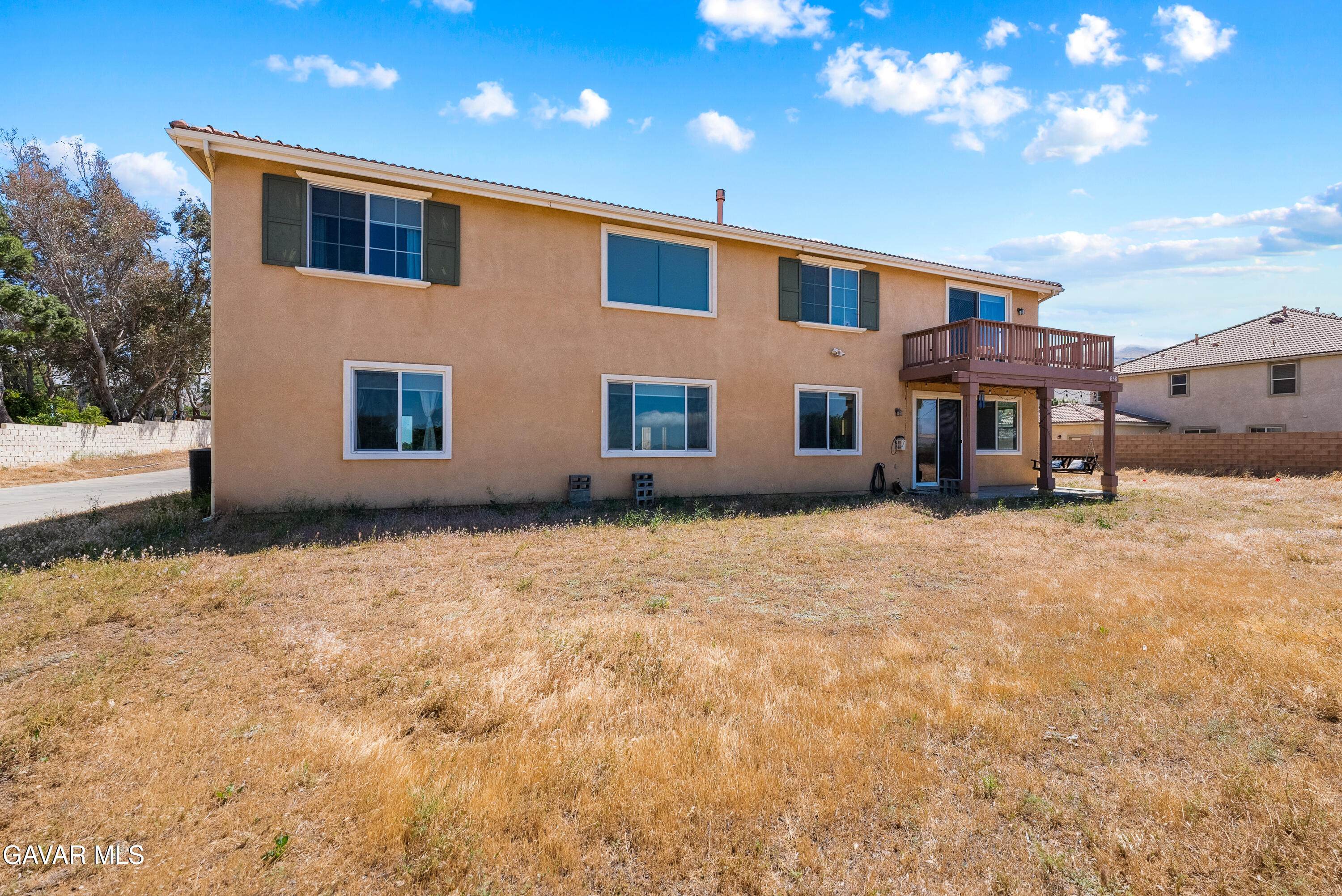 658 Lago Lindo Road Palmdale, CA 93550 - Photo 75 of 91 a house view with a backyard space