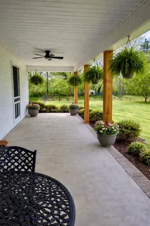 a view of outdoor space with garden and trees
