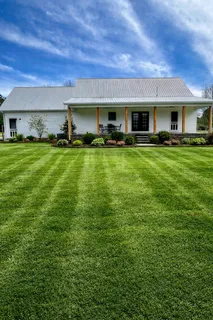 a view of a yard with a house