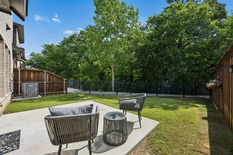 a view of swimming pool with patio